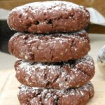 picture of chocolate olive oil cookies stacked on top of each other