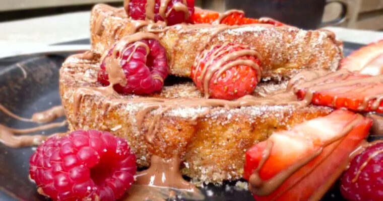 Churro French Toast (with milk chocolate, strawberries & raspberries)